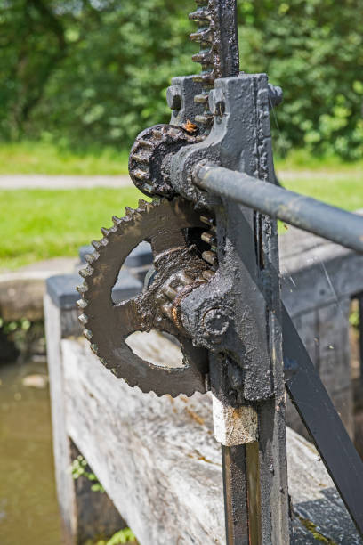istock Old winding gear on canal lock gate 1163143054
