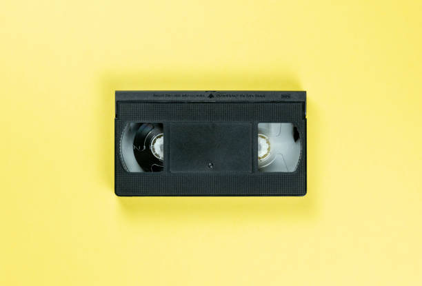 istock retro vhs video tape cassette on yellow background 1163145543