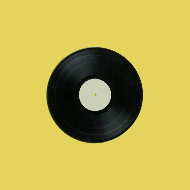 istock retro vinyl record with blank white label on yellow background 1163145593