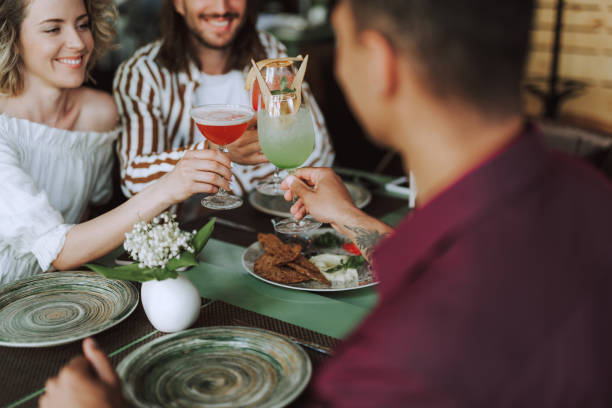 istock Friends toasting with cocktails while spending time in cafe 1163148261