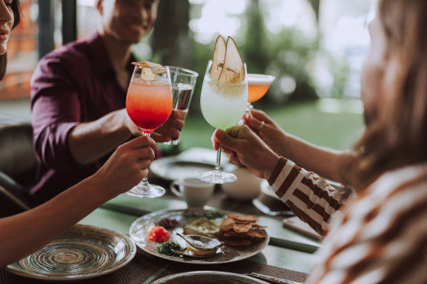 istock Friends toasting with cocktails while spending time in cafe 1163148266