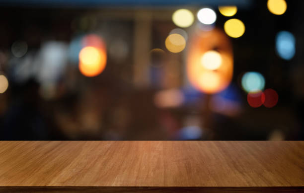 istock Empty dark wooden table in front of abstract blurred bokeh background of restaurant . can be used for display or montage your products.Mock up for space. 1163149131