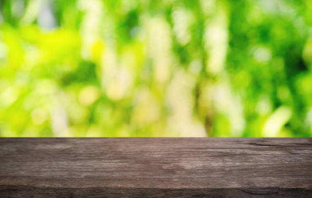 istock Empty dark wooden table in front of abstract blurred bokeh background of restaurant . can be used for display or montage your products.Mock up for space. 1163149152