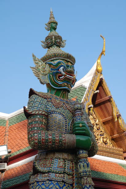 istock Bangkok, Thailand - 12.25.2012: Beautiful multi-colored sculptures and monuments in a Buddhist temple 1163150261