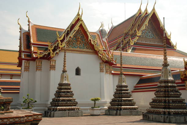 istock Bangkok, Thailand - 12.25.2012: Beautiful multi-colored sculptures and monuments in a Buddhist temple 1163150296