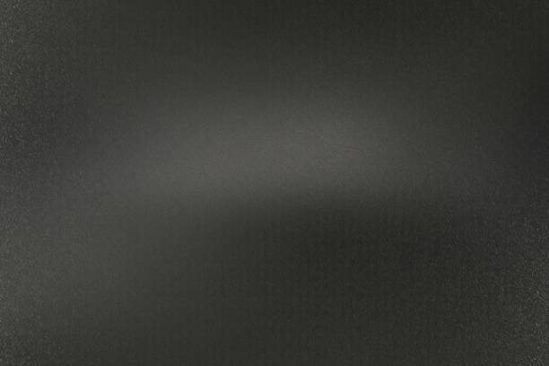 istock Dirty rough black metal plate, abstract texture background 1163154014