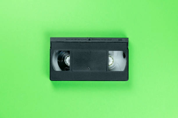 istock retro vhs video tape cassette on green background 1163154261