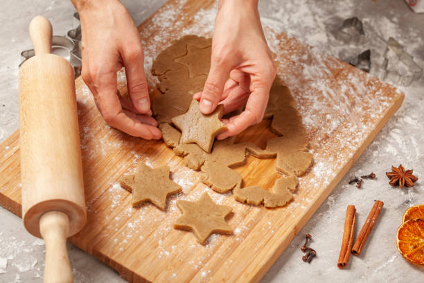 istock Christmas - preparing homemade gingerbreads 1163157475