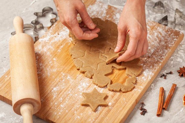 istock Christmas - preparing homemade gingerbreads 1163157493