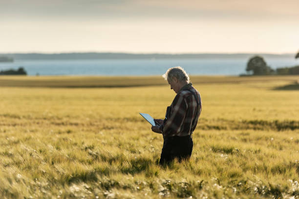 Farmer using technology to monitor his crops.
