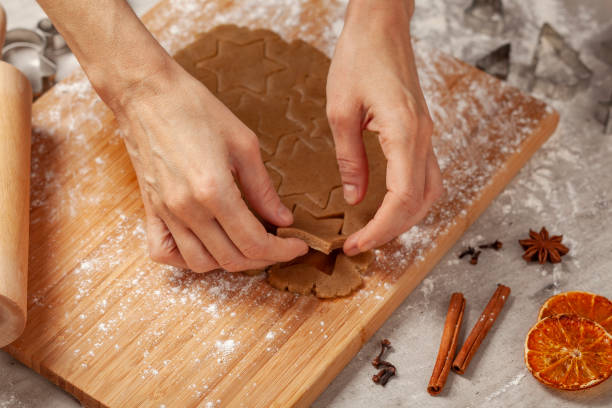 istock Christmas - preparing homemade gingerbreads 1163158053