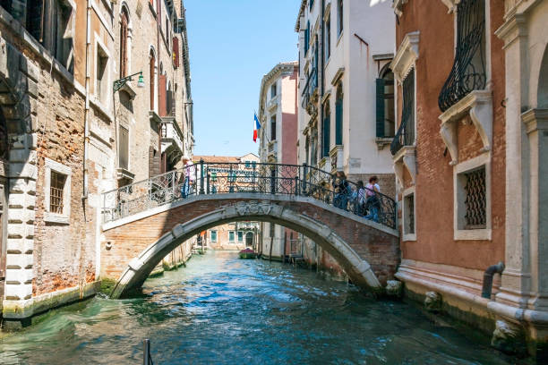 istock Everything in Venice is Historic, and this Footbridge and intersection of two canals beyond is no exception. 1163164046