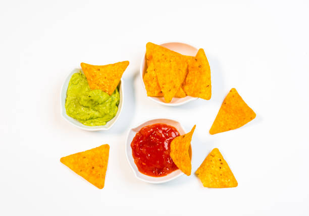 istock Guacamole sauce and spicy sauce accompanied by nachos. 1163168842