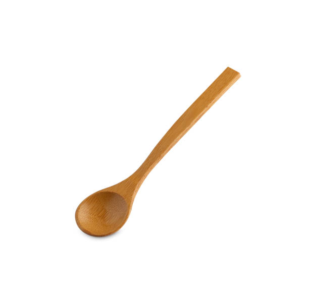 istock wooden spoon isolated on white background 1163169101