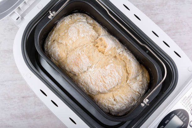 istock Homemade white flour bread baked in bread maker 1163175035