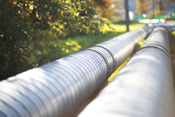 istock Industrial pipes on street construction 1163175860