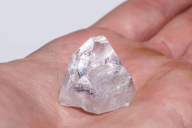 Dob rough diamond formed by volcanic heat and pressure inside earth in hand stock photo