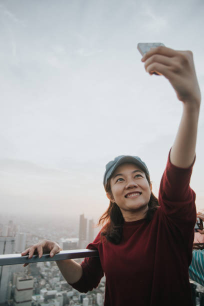 istock Having fun moment on weekend in Bangkok cityscape 1163181141