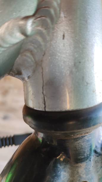 istock Cracked head tube on push bike. 1163181810