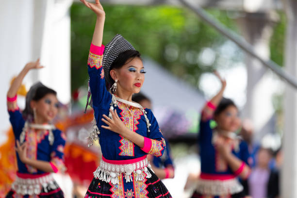 Asian Festival Columbus, Ohio, USA - May 26, 2019: Columbus Asian Festival, Young girls performing Hmong traditional dances, in the amphitheater at Franklin Park miao minority stock pictures, royalty-free photos & images