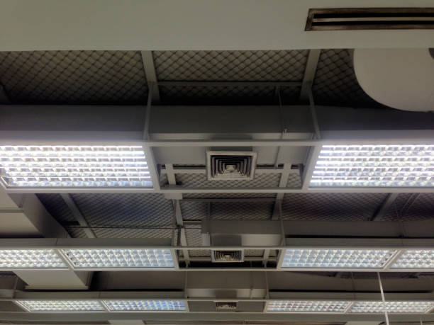 istock Air grille and lighting system. Ducting for air conditioner. System work on the floor. 1163184865