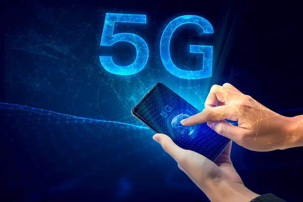 istock Creative connection background, mobile phone with hologram The concept of 5G network, high-speed mobile Internet, a new generation network has a wireless speed limit mixed media 1163186439