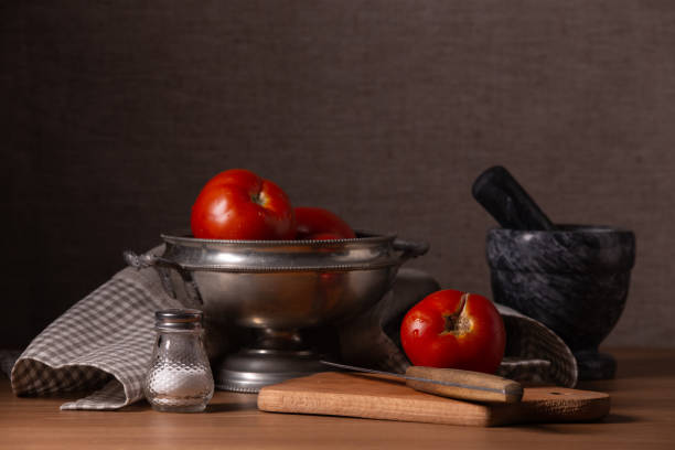 istock Vintage still life with red ripe tomatoes 1163189969