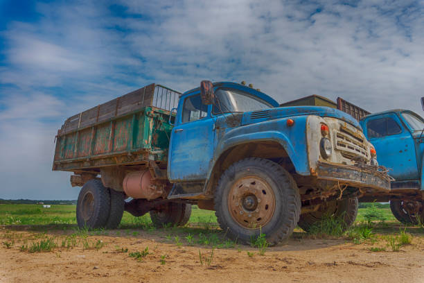 istock Old rusting truck or lorry outdoors in a field 1163191207