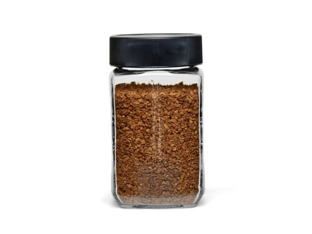 Glass jar filled with instant coffee