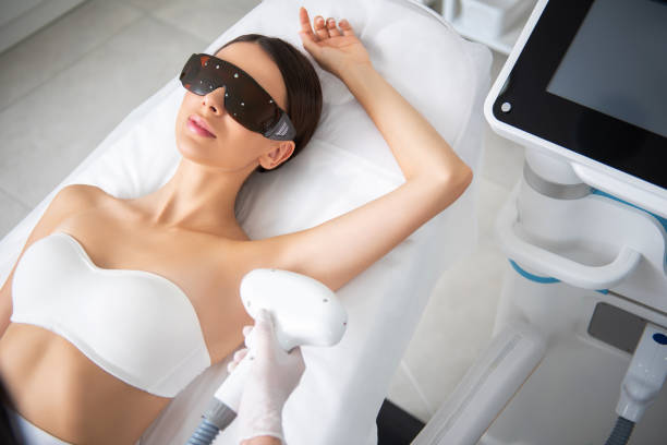istock Top view lady on armpit laser epilation procedure 1163194186
