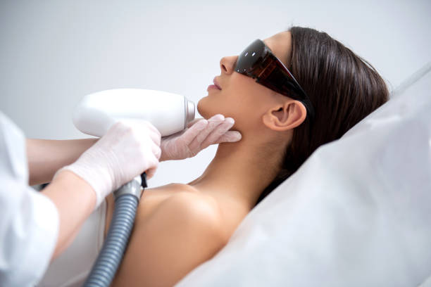 istock Pretty female on chin laser epilation procedure 1163194752