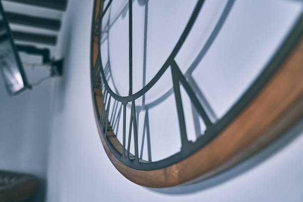 istock Modern metal and wood wall watch 1163196108