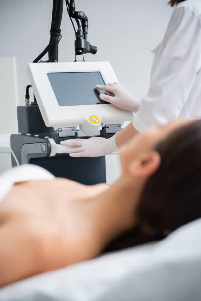 istock Adjusting device settings in laser cosmetic center 1163196882