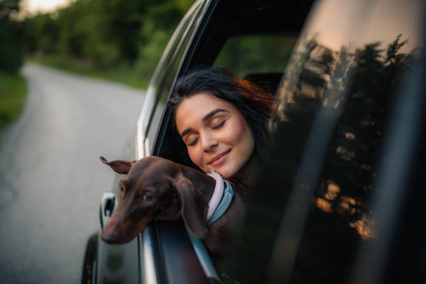 istock Beautiful woman with dog 1163197285
