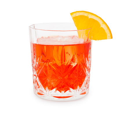 Negroni cocktail with orange slice isolated on white