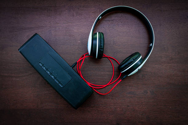 istock Speaker, headphone - wireless transmission stock,Modern listening audio system 1163201316