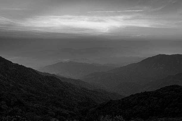 istock Mountains and sky, black and white images,Above the clouds 1163203313