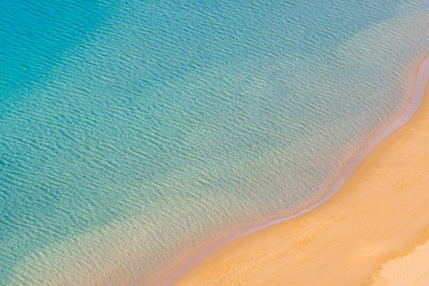 istock aerial view of clear sand beach 1163206901