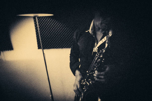 istock The saxophone player at the jazzclub 1163209743