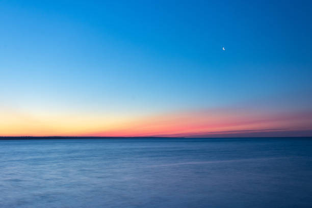 istock early morning sunrise on a choppy river 1163211297