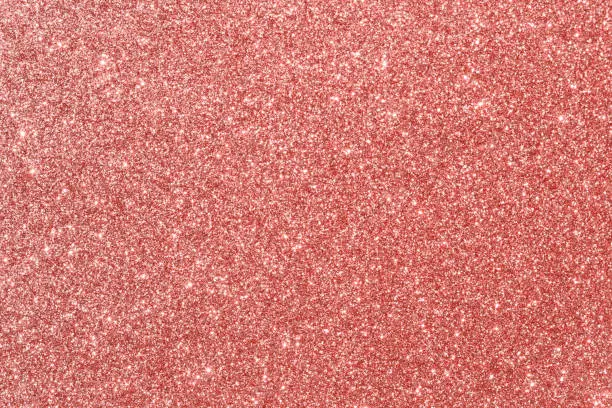 Photo of Coral pink red glitter background, sparkling shiny. Christmas holiday decoration