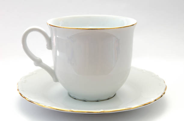 cup and saucer tea cup and saucer from porcelain saucer stock pictures, royalty-free photos & images