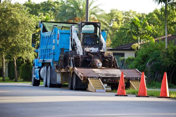 istock Dump truck with equipment trailer 1163225423
