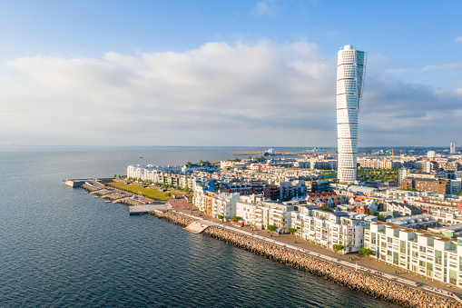 Beautiful aerial view of the Vastra Hamnen (The Western Harbour) district in Malmo, Sweden, during sunset. View from above.