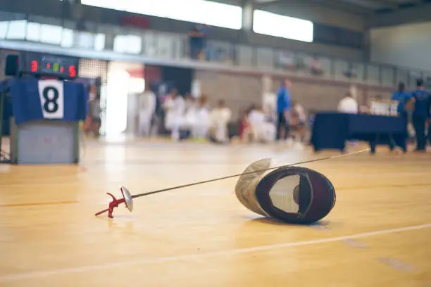 Photo of Floret and mask, equipment for fencing competition.