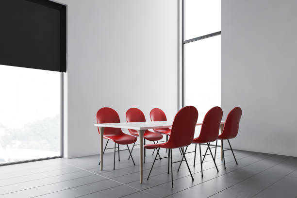 istock White conference room corner with red chairs 1163227175