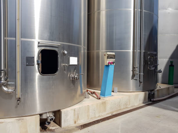 istock An open door in an empty steel cistern 1163227381
