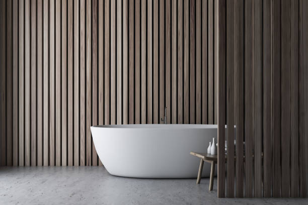 istock Light wooden bathroom interior with tub 1163228214