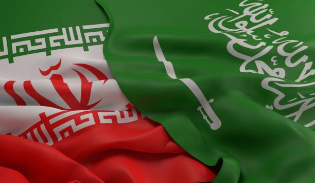 Flags of Saudi Arabia and Iran Flag of Saudi Arabia laying over the Iranian flag iran stock pictures, royalty-free photos & images