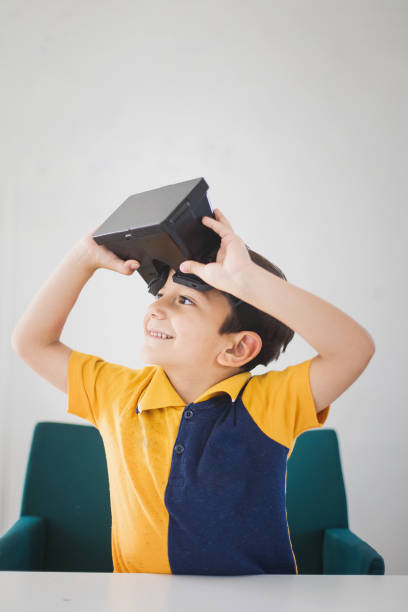 istock Child is discovering the virtual reality glasses 1163232021